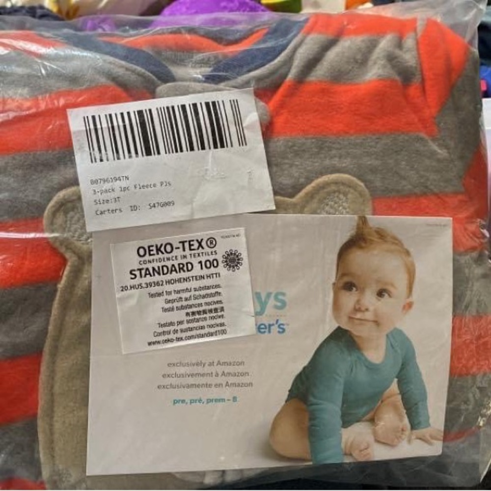 UNOPENED brand new 3T carters fleece footie jammies. 3 pack.